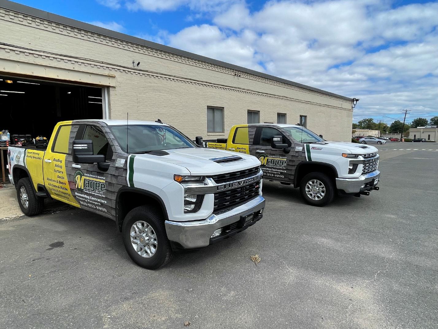 A home with a Magee Companies sign in the front lawn